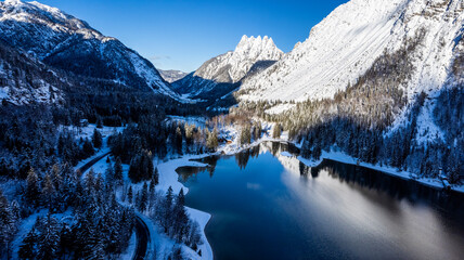 Magic and emotions of the Predil lake in a winter guise. Tarvisio. Top view