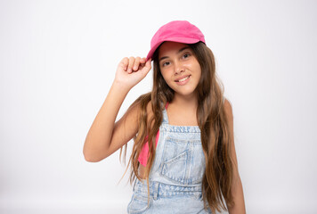 Little girl wearing a pink cap on a white background.
