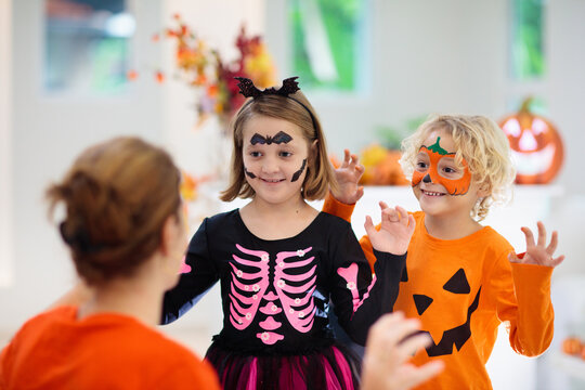 Child in Halloween costume. Kids trick or treat.