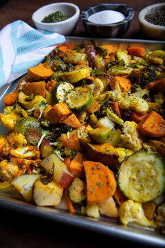 A mixed of Roasted vegetables background on a Baking Sheet