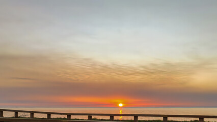 Fototapeta na wymiar sunrise on the beach with special sunshine on the coast