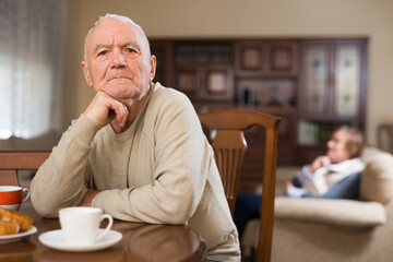 Senior man and woman quarreling at home. High quality photo