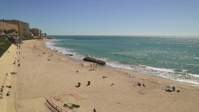 Captivating footage of Santa Maria del Mar beach in Cadiz, Andalsuia province, Spain