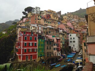 Fototapeta na wymiar Stacked colorful buildings in Cinque Terra, Italy