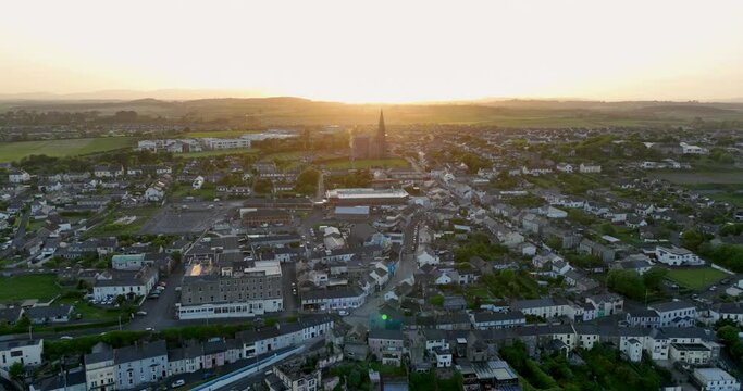 The city of Tramore at sunset. A wide coastline 4k
