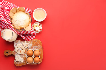 Composition with ingredients for preparing tasty cookies on red background