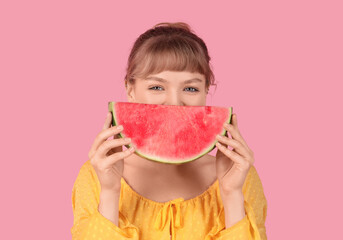 Young woman with fresh watermelon on pink background, closeup