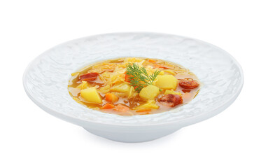 Delicious sauerkraut soup with smoked sausages and dill isolated on white