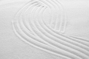 Fototapeta na wymiar White sand with pattern as background, closeup. Concept of zen and harmony