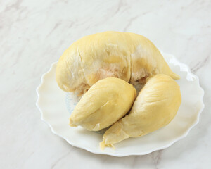 Fresh Durian King of Fruit on White Plate
