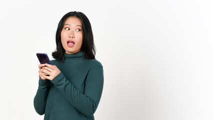 Fototapeta premium Holding Smartphone and looking side Of Beautiful Asian Woman Isolated On White Background