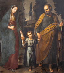 NAPLES, ITALY - APRIL 20, 2023: The detail painting of Holy Family in church Basilica di Santa Maria degli Angeli a Pizzofalcone by Giovanni Bernardino Azzolino (1572 – 1645).
