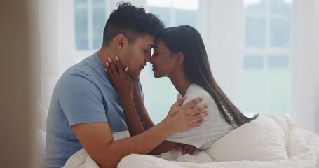 Love, morning and couple in bed for intimacy, care and affection at home for healthy relationship. Romance, marriage and man and woman in bedroom with faces together for bonding, trust and embrace