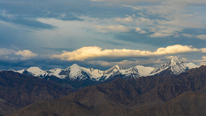 Panoramic view of high-altitude snowcapped mountain ranges of Ladakh, India 