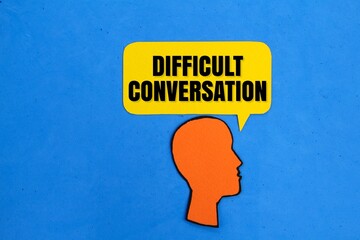 the shape of a person's head and a conversation box with the word difficult conversation. difficult...
