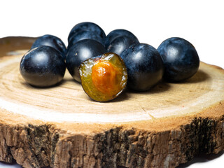  fruit of Blackthorn. Type of plum genus. early fruit on a white background. Tart sour taste.