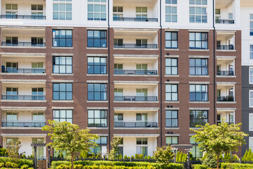 Brand new apartment building on summer. Canadian modern residential architecture. Modern complex of apartment buildings