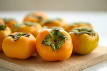 Fresh persimmon fruit in autumn season