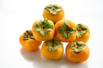 Fresh persimmon fruit in autumn season