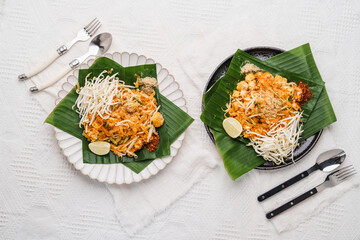 Pad Thai in white and black plate