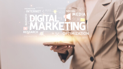 Digital marketing concept with businesswoman holding a smartphone in her hand.