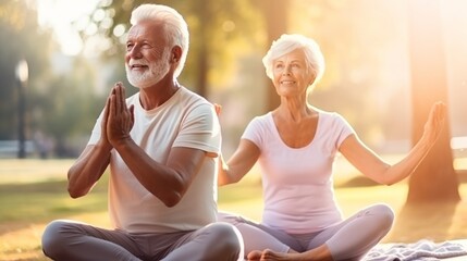 Fototapeta na wymiar Yoga at park. Senior family couple exercising outdoors. Concept of healthy lifestyle
