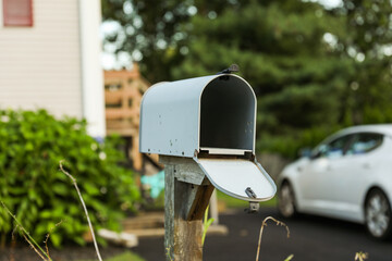 Home mailbox: A symbol of connection, awaiting news and messages. Reflects a sense of belonging and communication in one's personal space