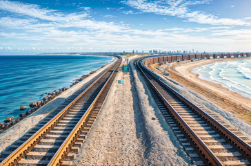 Fototapeta na wymiar Seaside Serenity: Tranquil Train Track Views