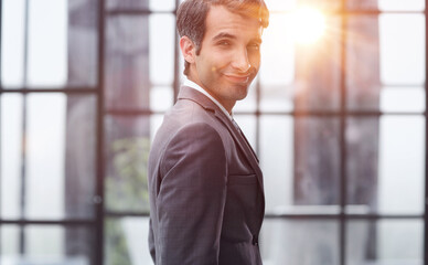 Portrait of thoughtful businessman in modern office