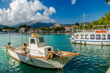 Harbour with wooden fishing boats in Greece - 639137175
