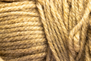 Micro close up of beige wool threads with copy space