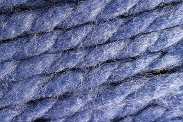 Micro close up of purple wool threads with copy space