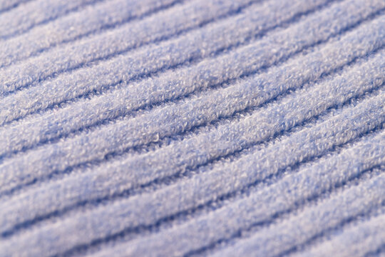 Fototapeta Micro close up of lilac wooly knitted fabric with copy space