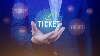 Businessman holding with button Ticket word, Business, Technology, internet and networking concept businessman pressing online booking button on virtual screens.
