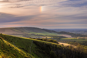 A sundog over Folkington Hill from Combe Hill Butts Brow on the south downs near Polegate east...