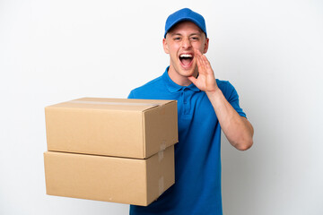 Young delivery Brazilian man isolated ops white background with surprise and shocked facial expression