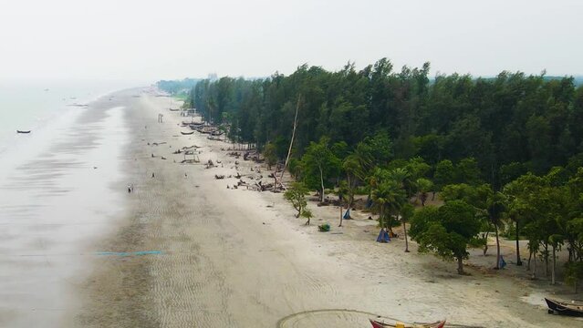 Aerial Revealed Traditional Fishing Boat At The Seashore Of Kuakata Sea Beach In Bangladesh. Drone Shot