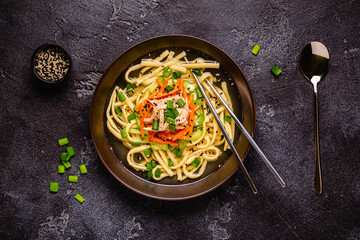 Traditional Korean chicken soup with homemade noodles