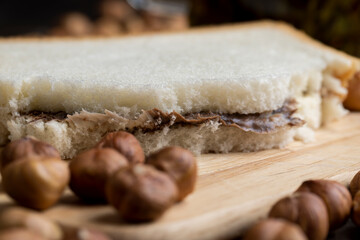 slices of bread with chocolate butter on the table