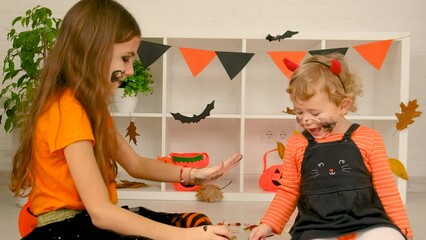 Halloween holiday child and pumpkin. Selective focus.