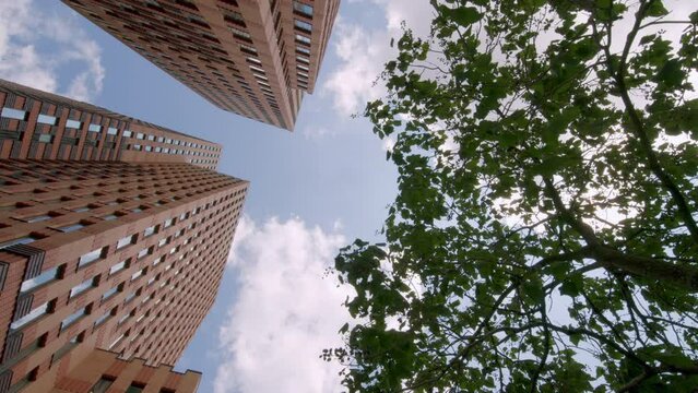 Symphony Skyscrapers At Zuidas (South Axis) Financial District In Amsterdam, Netherlands. Orbiting, Low Angle