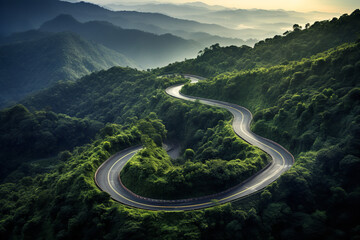 Winding through a dense forest, a mountain pass road with its challenging hairpin bends offers a thrilling driving experience - obrazy, fototapety, plakaty