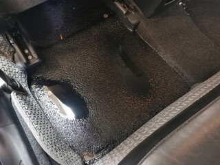 wet carpet inside the car