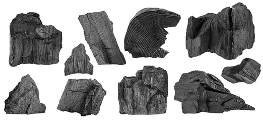 Set of natural wood charcoal pieces isolated on a white background