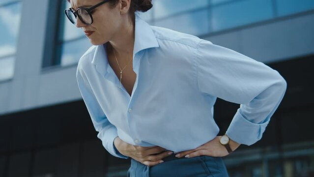 Woman feeling unbearable stomach ache, inflammation of gallbladder or appendix