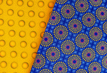 Colorful South African Iconic printed fabric known as Shwe Shwe. blue and yellow prints. 