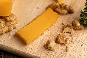 Fototapeta premium Sliced hard cheese made from milk