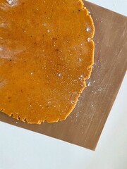 Photo of gingerbread dough. Background is simple
