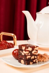Black sesame balls walnut candies, round and square candies, healthy breakfast, delicious snack