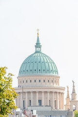 Saint Nicholas Church at Old Market square in the historical downtown at sunny day, Potsdam, Germany.